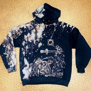 Hand painted using bleach on BLACK hoodie
